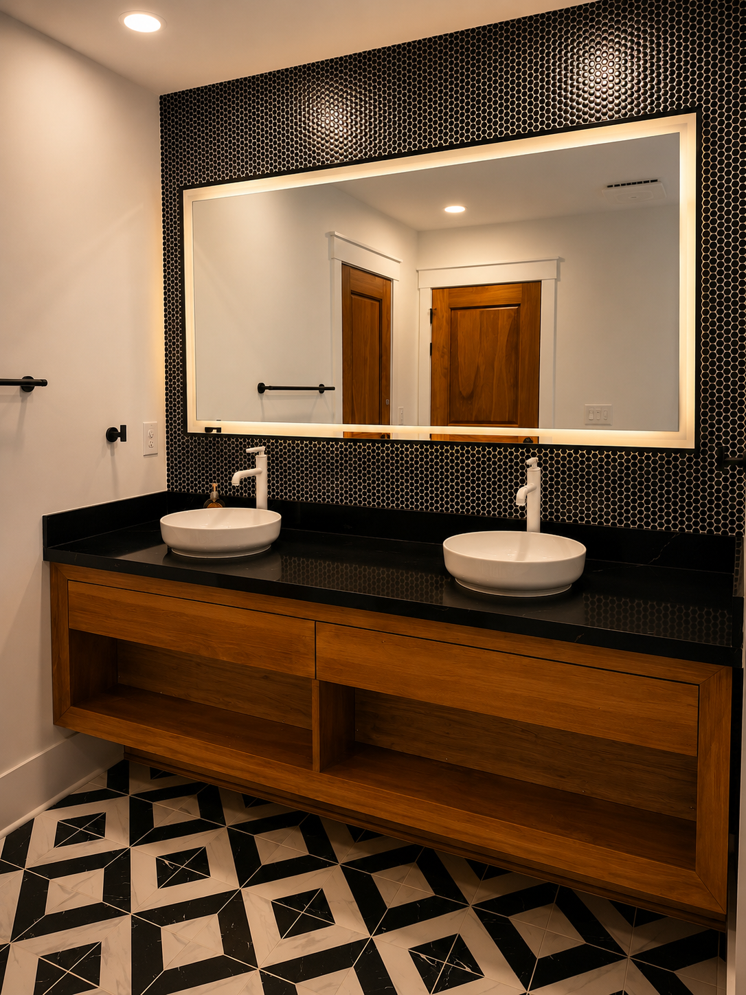 Floating walnut double vanity with backlit mirror